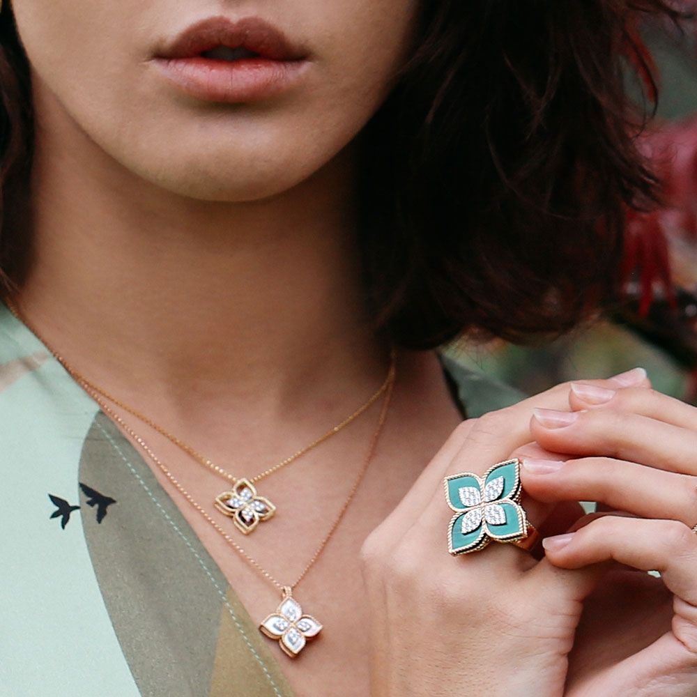 PRINCESS FLOWER RING WITH DIAMONDS AND MALACHITE