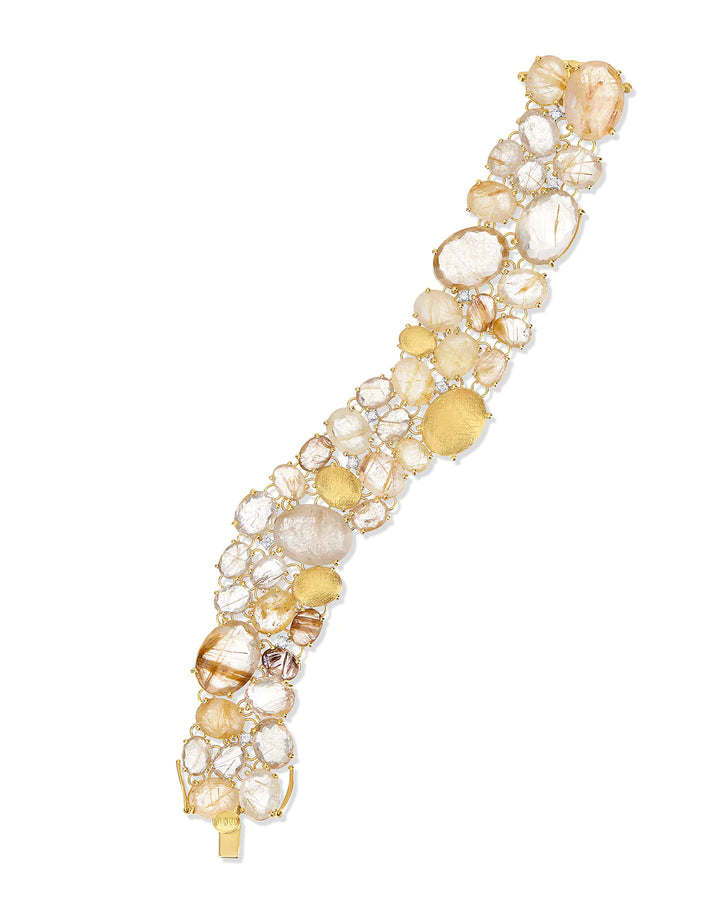 "IPANEMA" YELLOW RUTILATED QUARTZ, DIAMONDS AND GOLD CUFF BRACELET