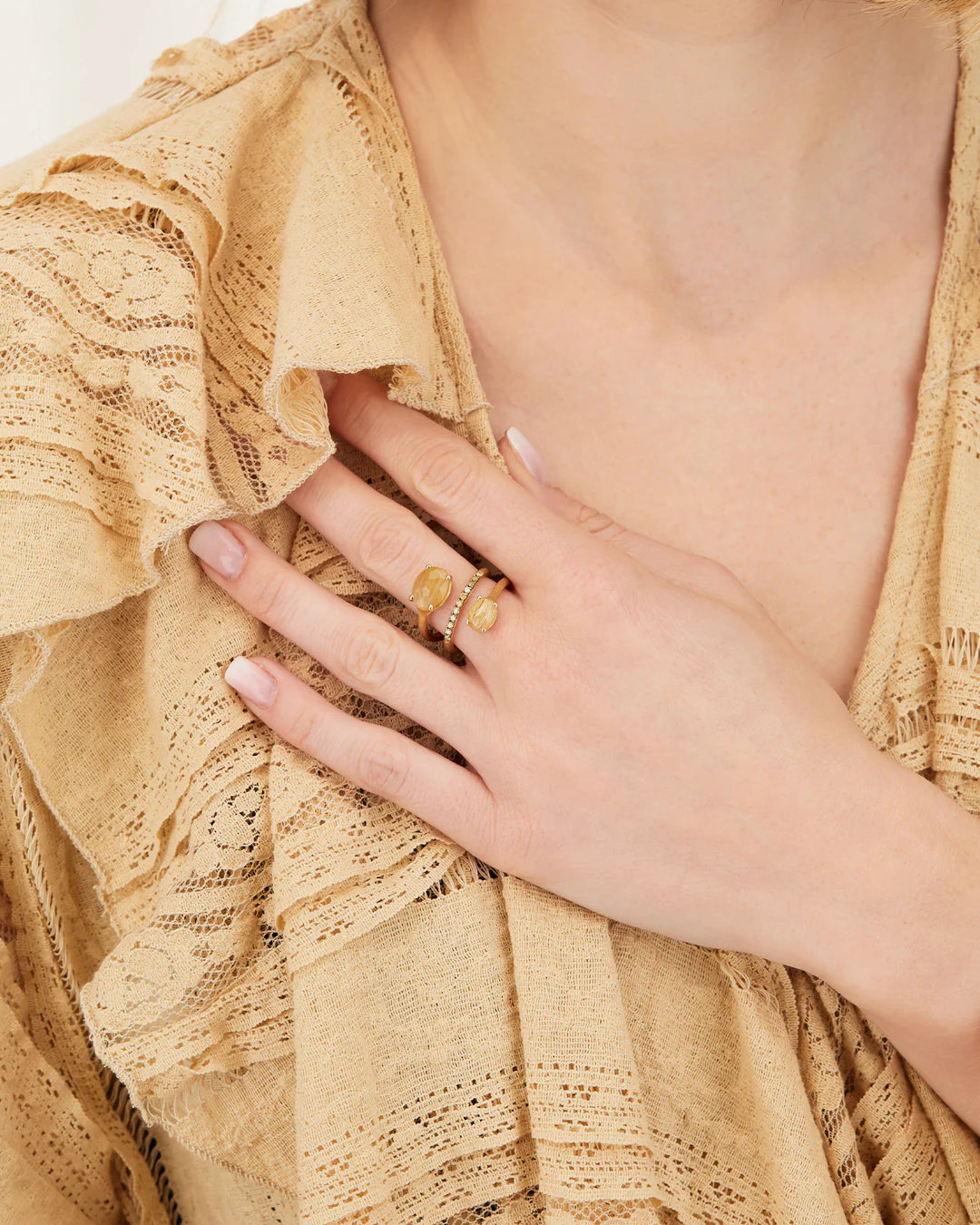 "IPANEMA" YELLOW RUTILATED QUARTZ, DIAMONDS AND 18KT GOLD SPIRAL RING