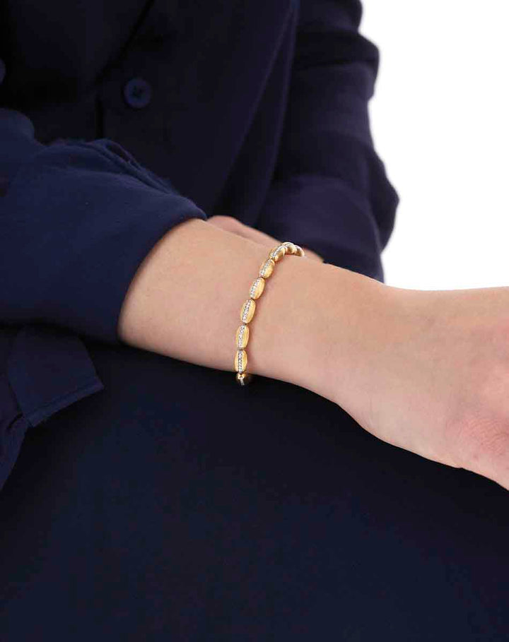 "DIVA" GOLD AND DIAMONDS TENNIS BRACELET