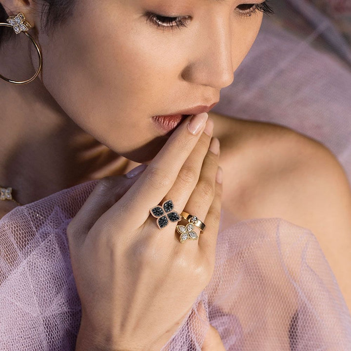 PRINCESS FLOWER RING WITH BLACK DIAMONDS